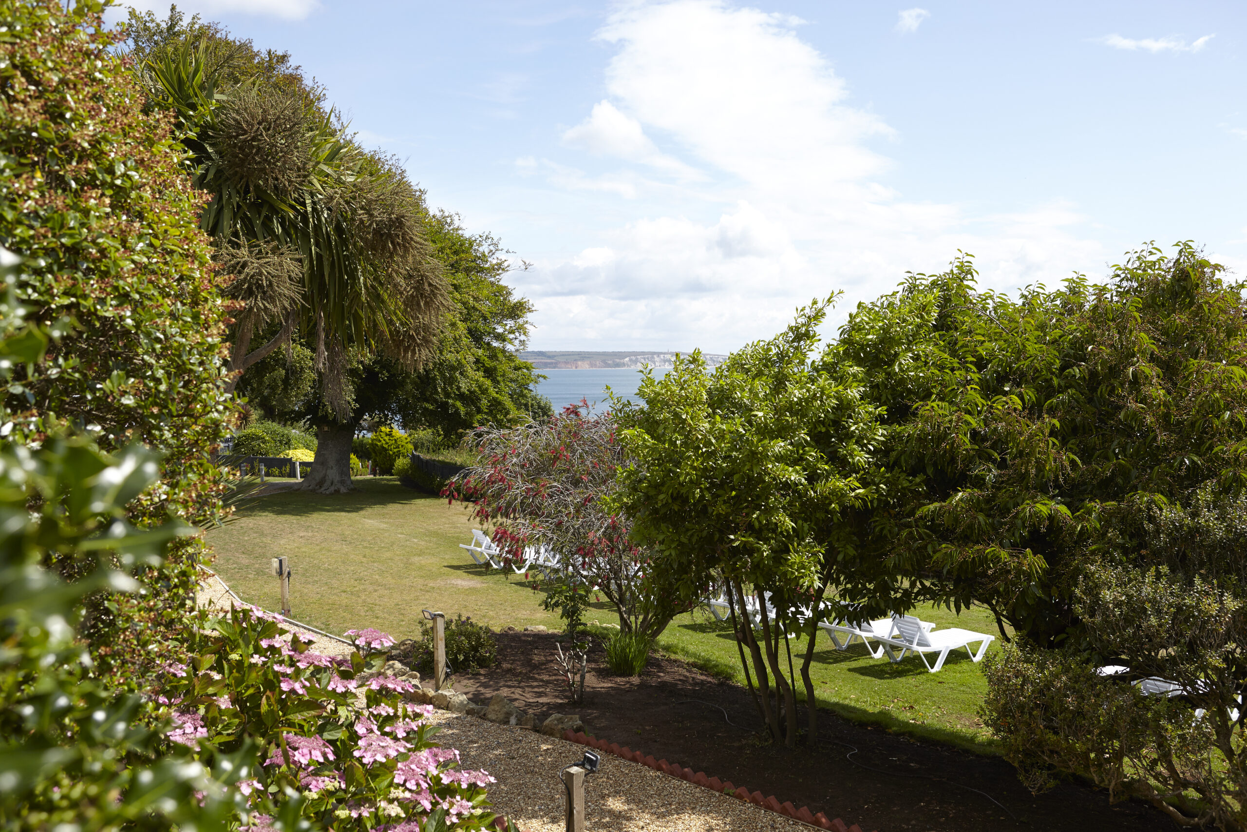Luccombe Hall Hotel Gardens, Sea View, Loungers and Pathway